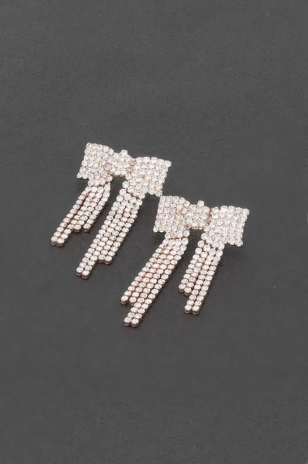Rhinestone ribbon earrings, silver-tone with dangling rows of crystal studs
