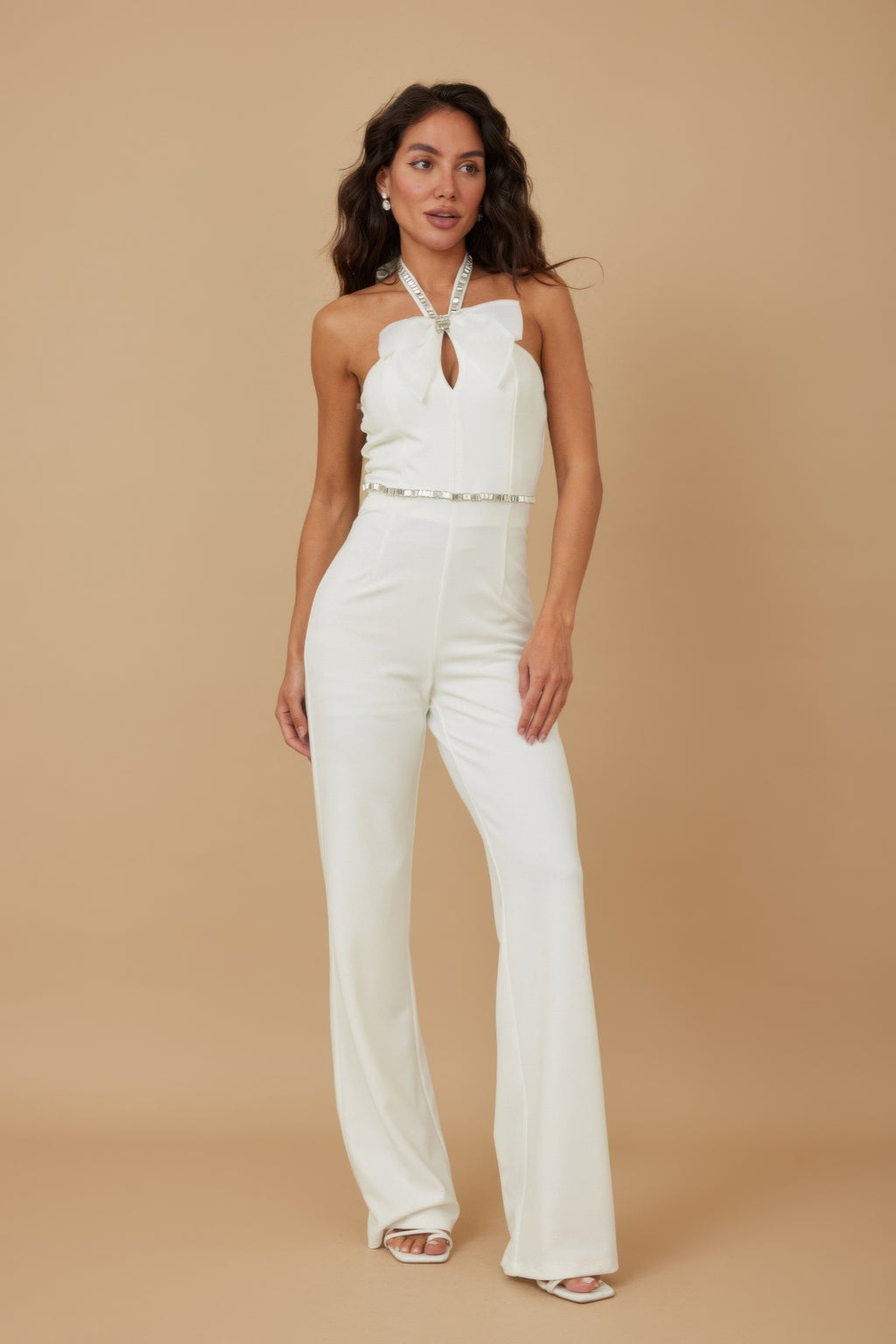 White rhinestone halter jumpsuit with ribbon bow and wide-leg trousers