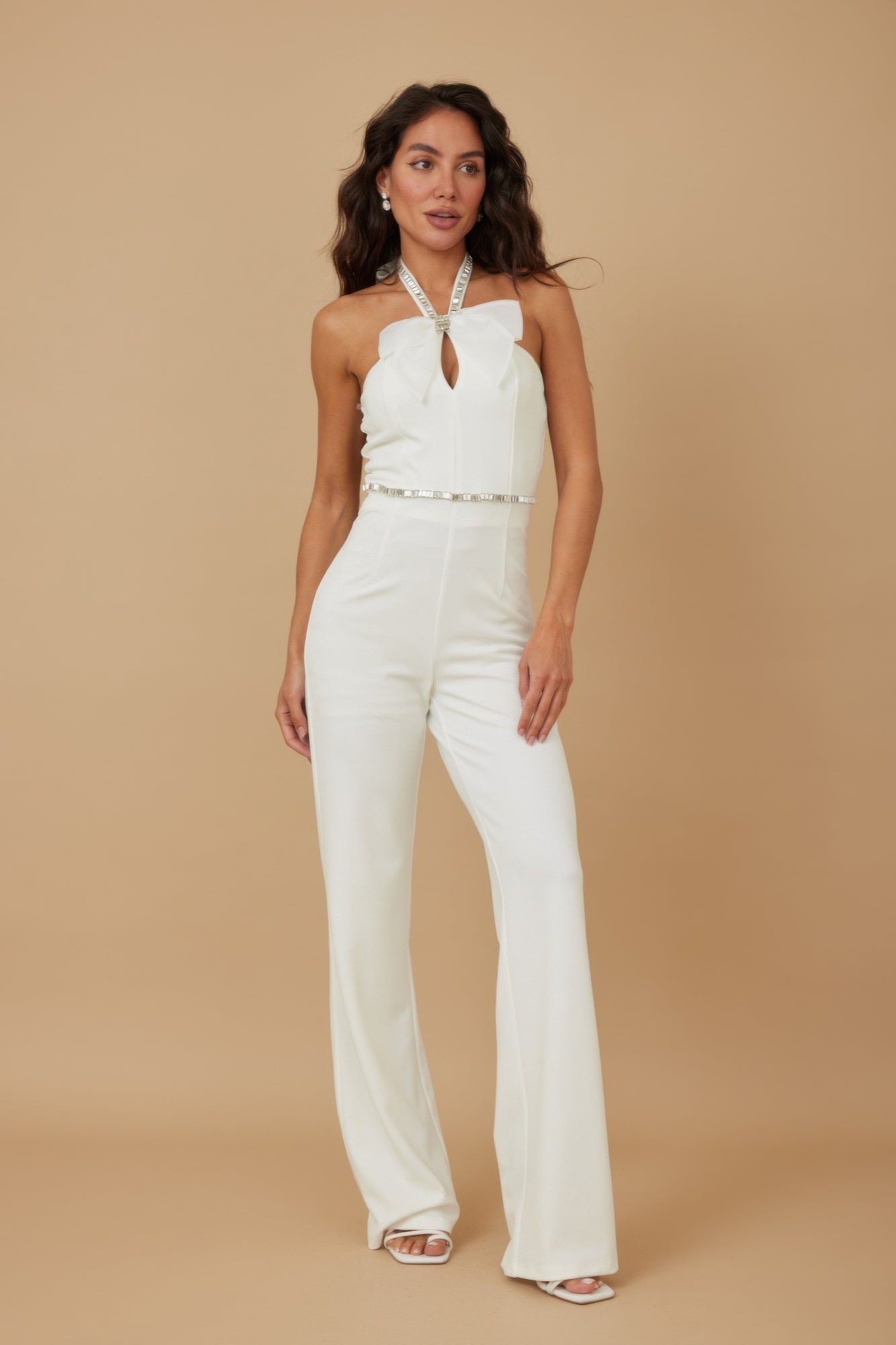 White rhinestone halter jumpsuit with ribbon bow and wide-leg trousers