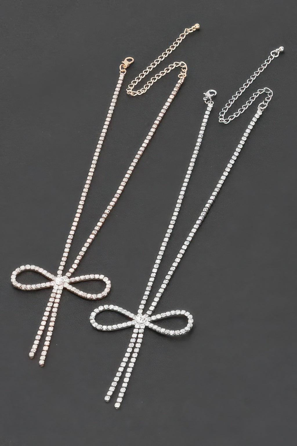 Rhinestone ribbon necklace with bow pendant and long rhinestone chain