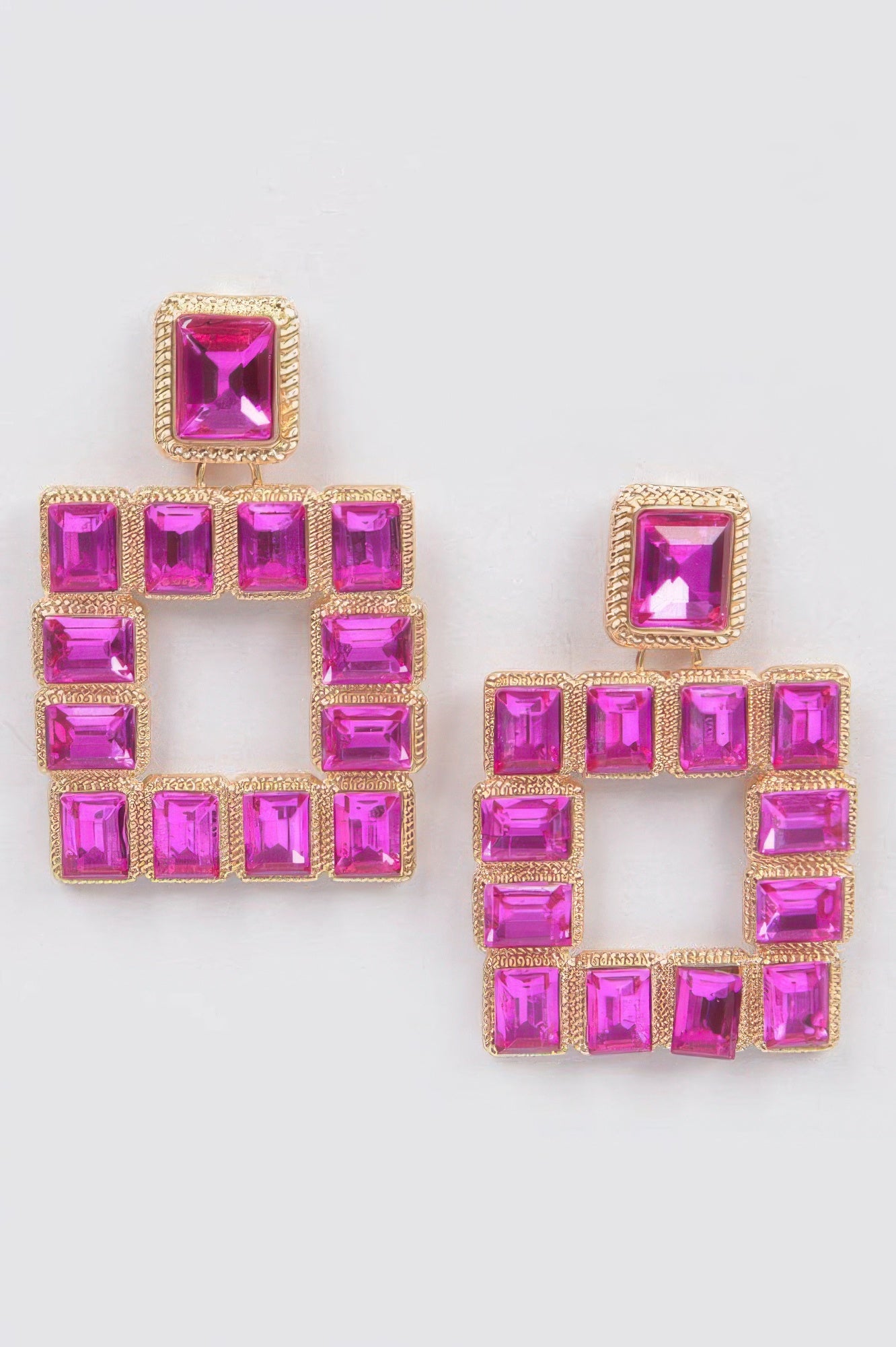 Fuchsia/pink square rhinestone earrings with gold-tone border and open center