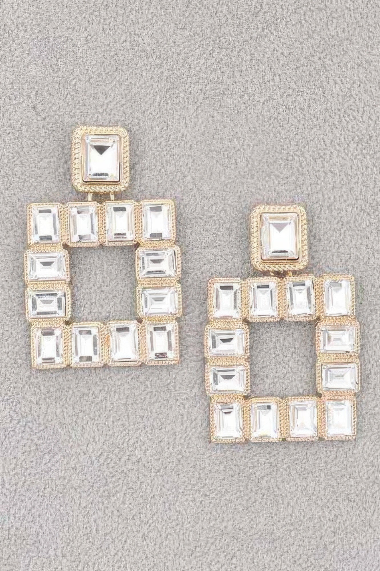 Clear/white square rhinestone earrings with gold-tone edges, open square center