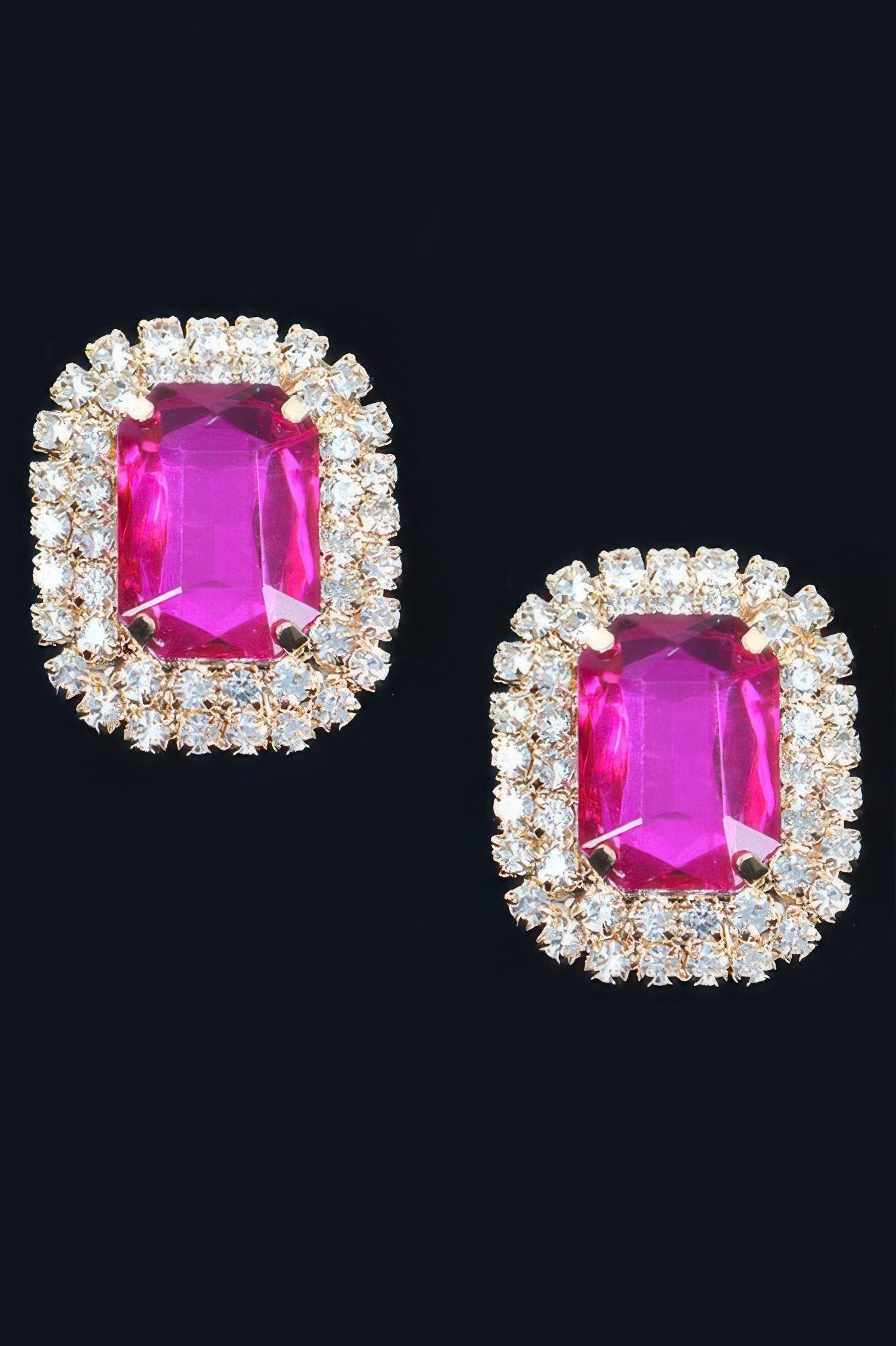 Rhinestone stud earrings with fuchsia-pink square crystal haloed by silver-tone stones