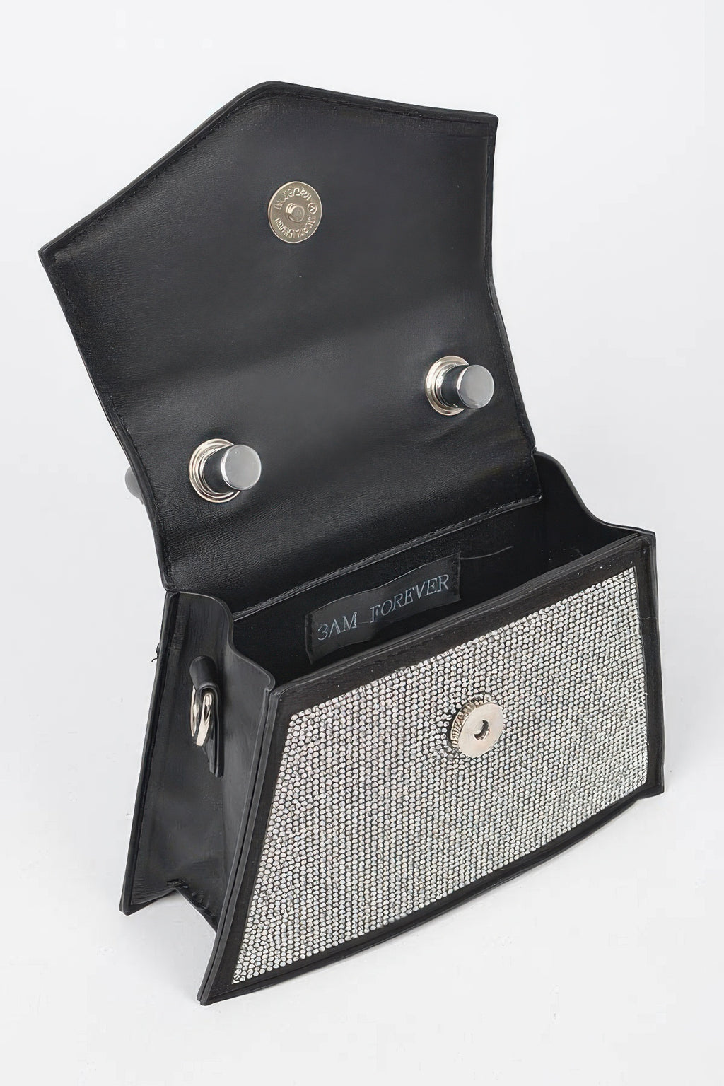 Black rhinestone crossbody bag open showing interior pocket and snap-button closure