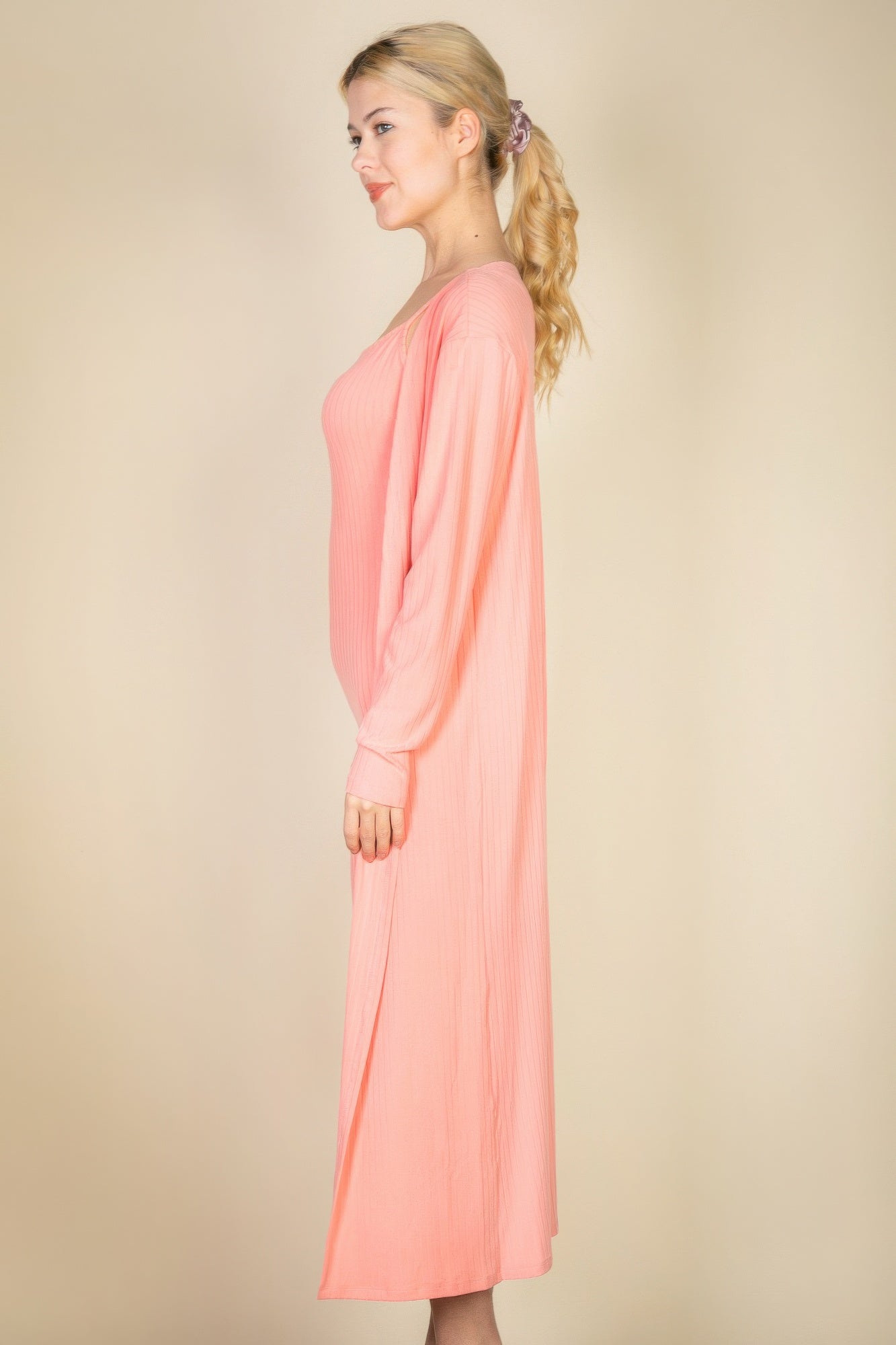 Salmon ribbed midi dress with long cardigan, side view