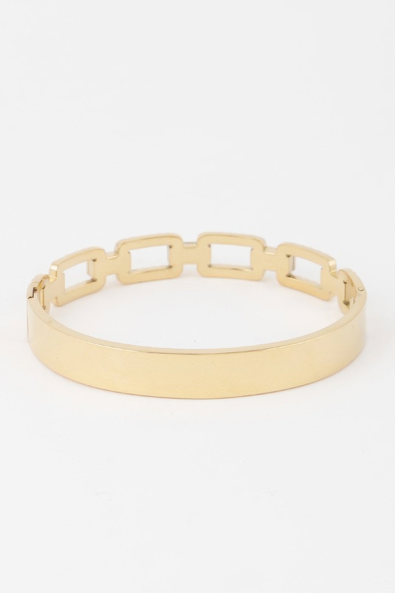 Gold ribbed chain bracelet with square cutout links and open hinged clasp