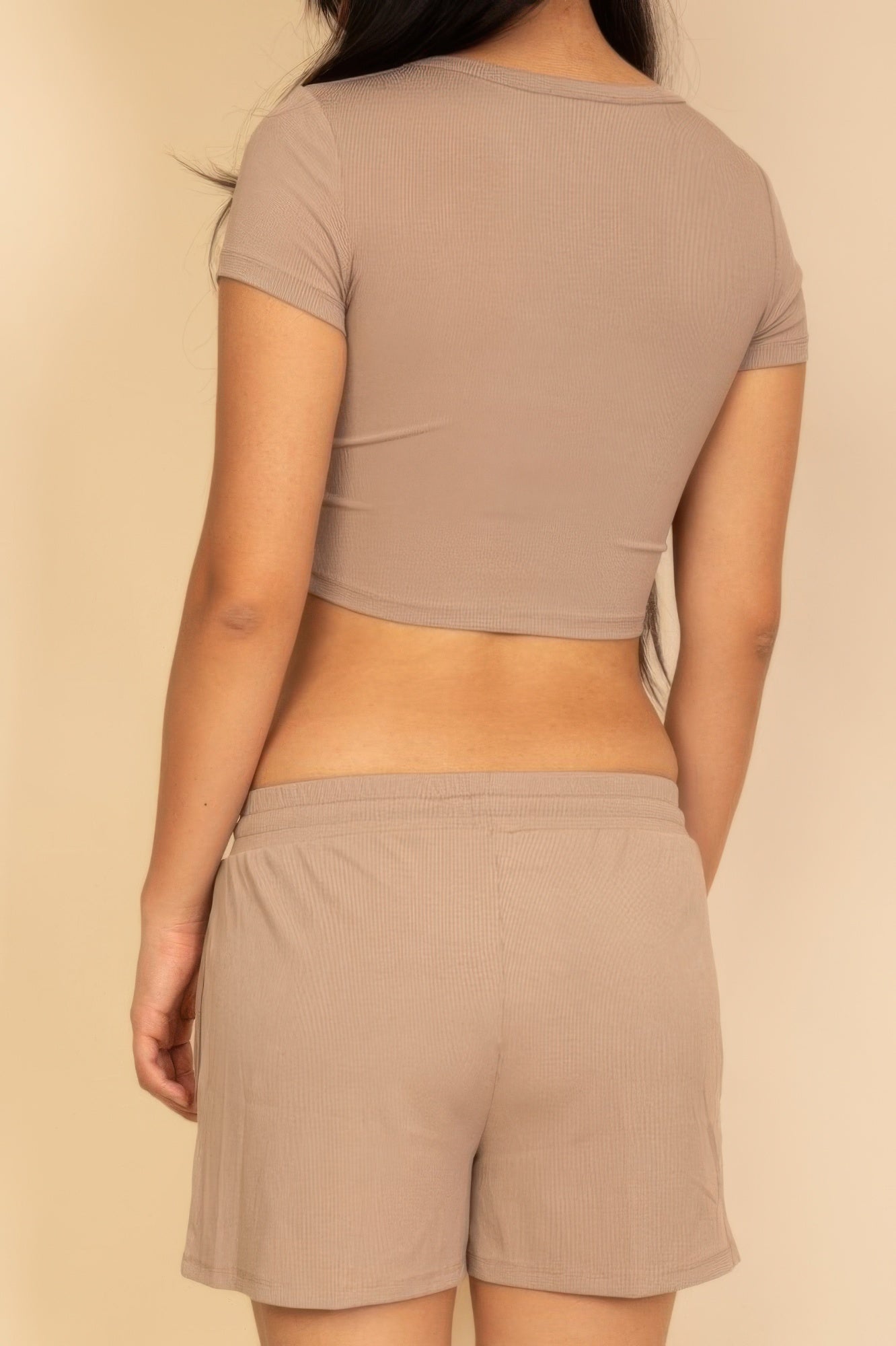 Taupe ribbed knit lounge shorts with drawstring waistband, back view