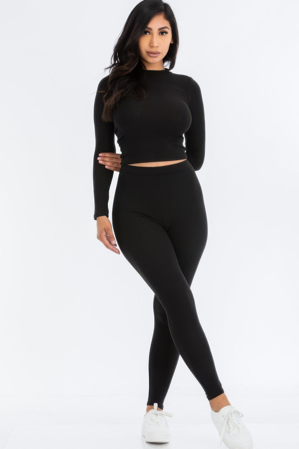 Black ribbed mock neck long-sleeve crop top and high-waist leggings set.