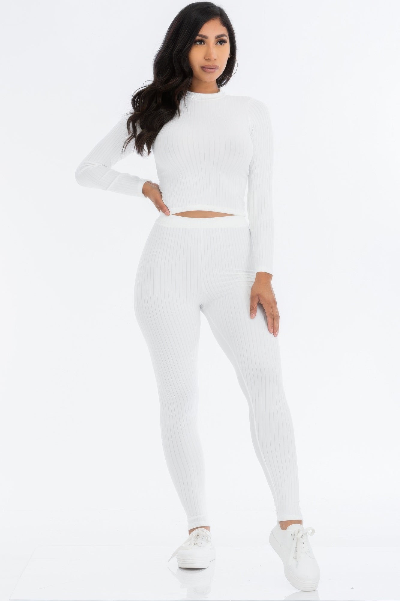 White ribbed mock neck long-sleeve crop top and matching high-waist leggings set.