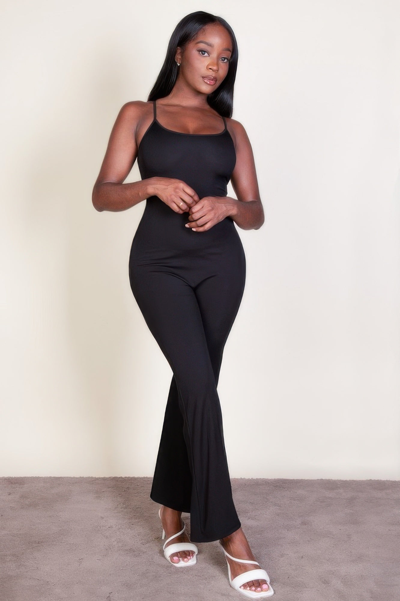Black ribbed sleeveless wide-leg jumpsuit with square neckline