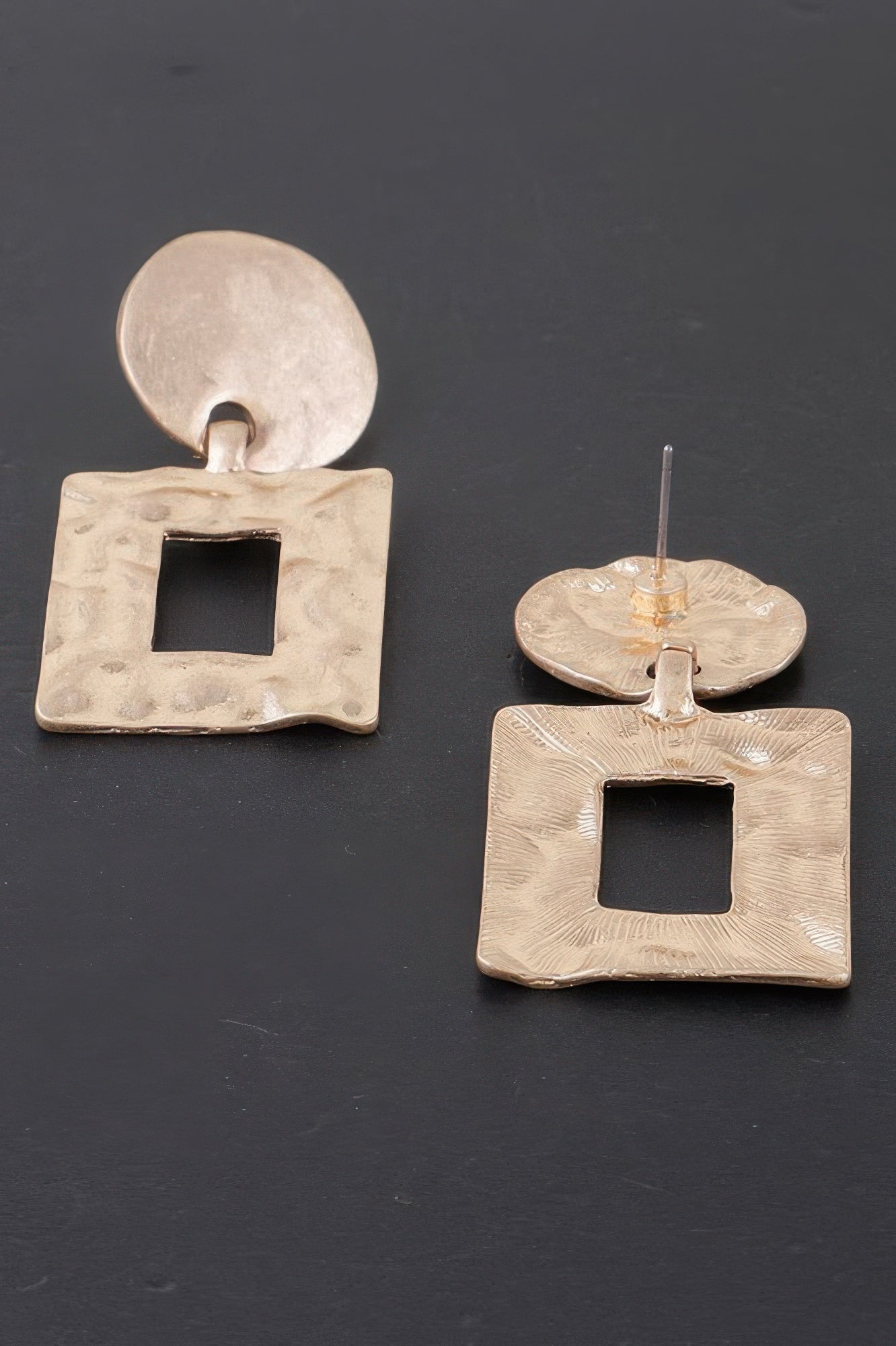 Gold-tone stud-top drop earrings with square cutout in hammered ripple frame