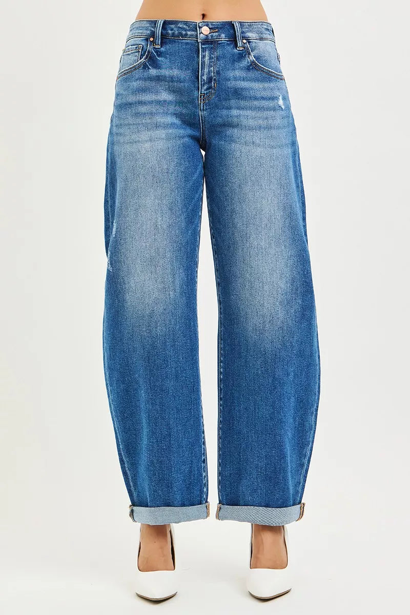 Dark blue mid-rise barrel jeans with double roll-up cuffs and front pockets