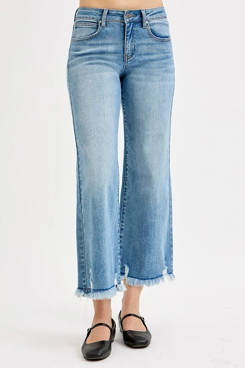 Light-wash wide-leg crop jeans, back view with center seam and frayed hems