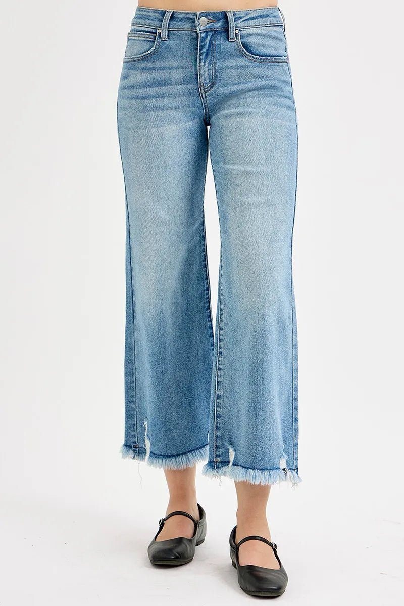 Light-wash wide-leg crop jeans, front view with button fly and frayed cuffs