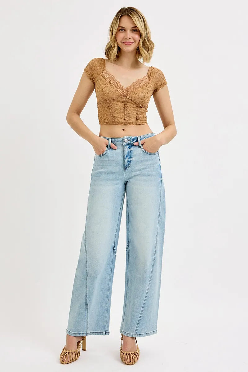 Light-wash mid-rise barrel jeans with relaxed fit and button fly (plus size)