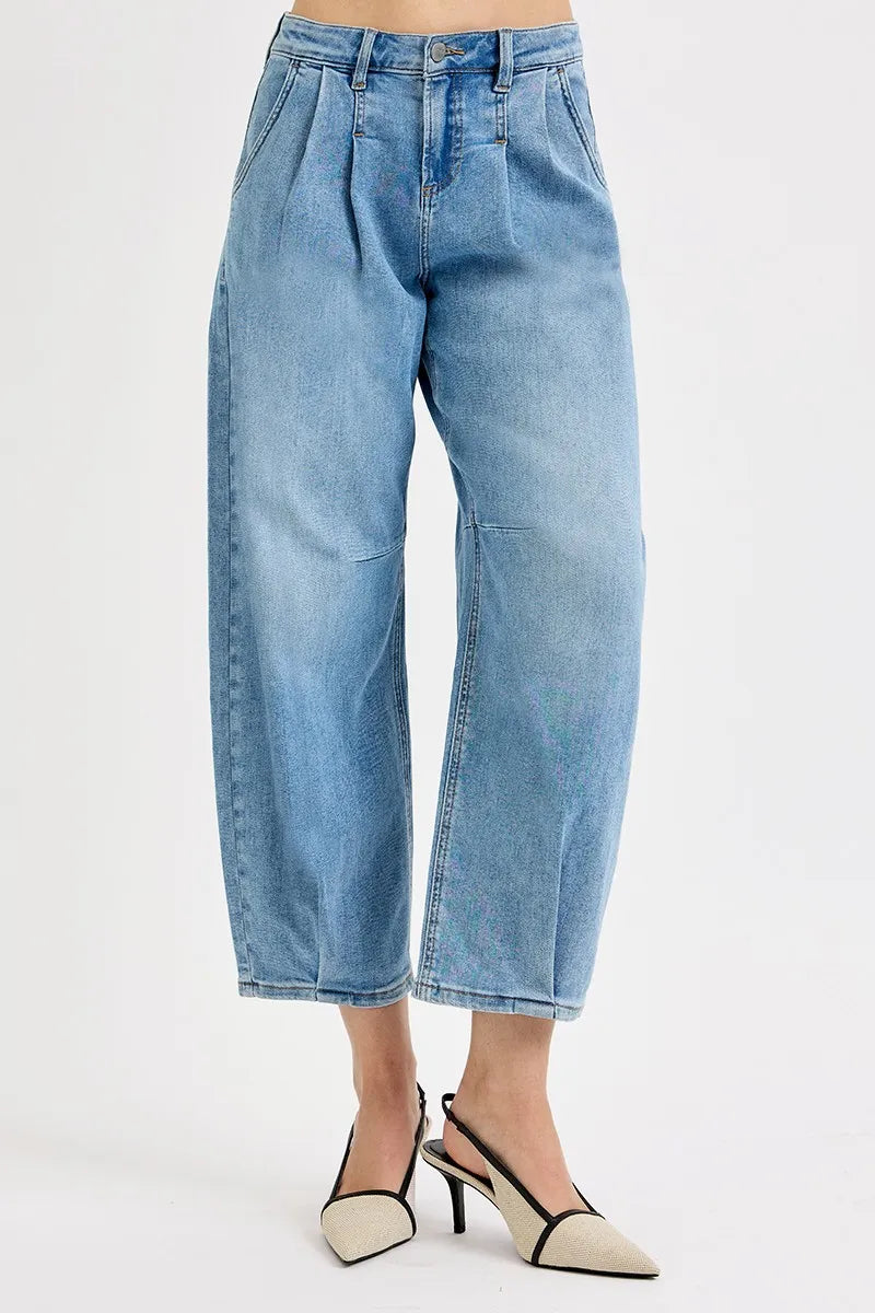 Medium-wash mid-rise crop wide-leg jeans, relaxed roomy fit with front pockets