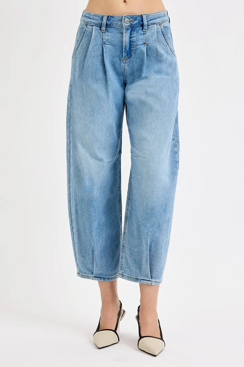 Medium-wash mid-rise crop wide-leg jeans with button closure and front pockets