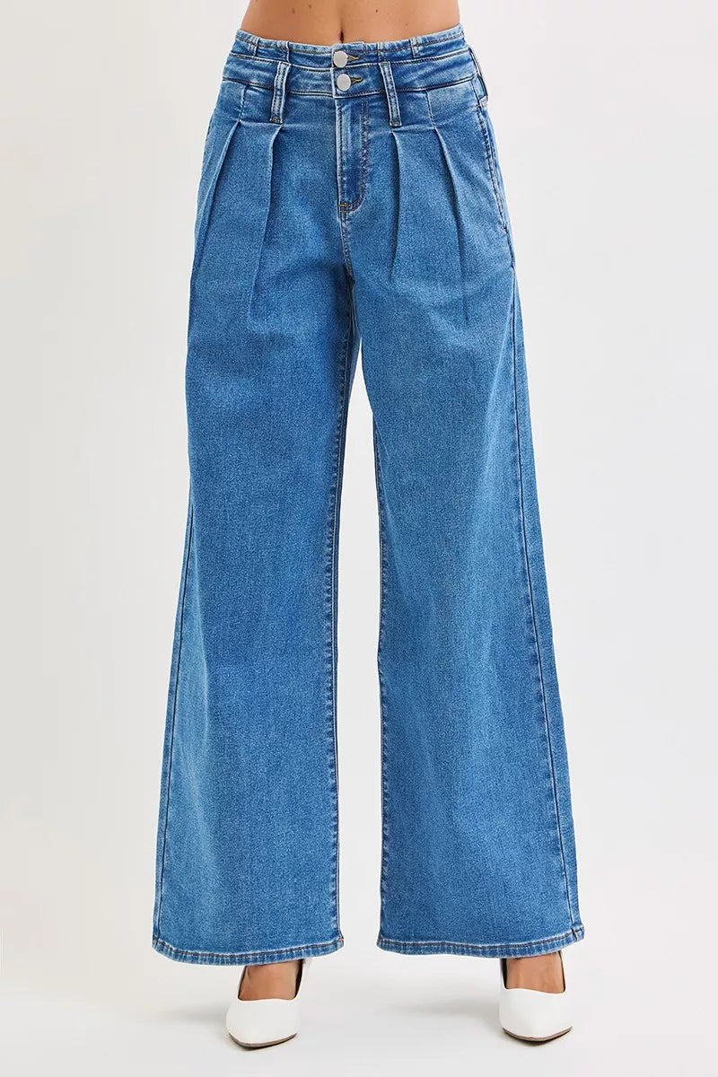 Medium wash wide-leg jeans with pleated front, classic five-pocket style