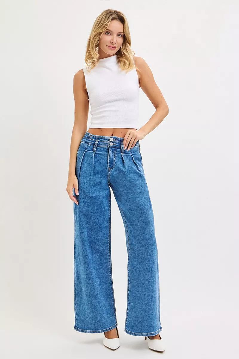 Medium wash denim wide-leg jeans, mid-rise fit with pleated waist detail