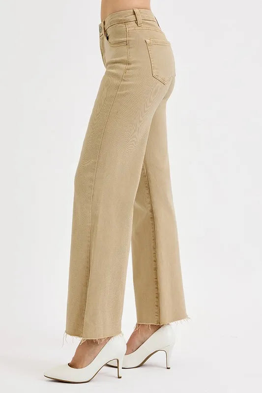 Tan wide-leg jeans with back pocket and frayed raw hem