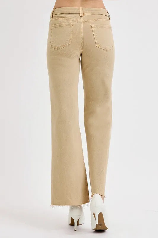 Tan wide-leg jeans with two back patch pockets and raw frayed hem