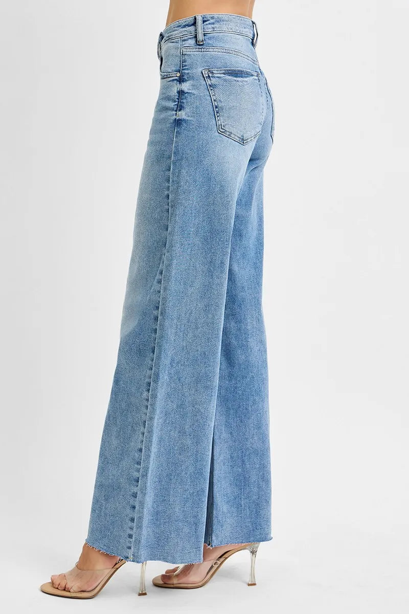 Light wash palazzo jeans, high-rise waist, side pocket detail and flared leg opening
