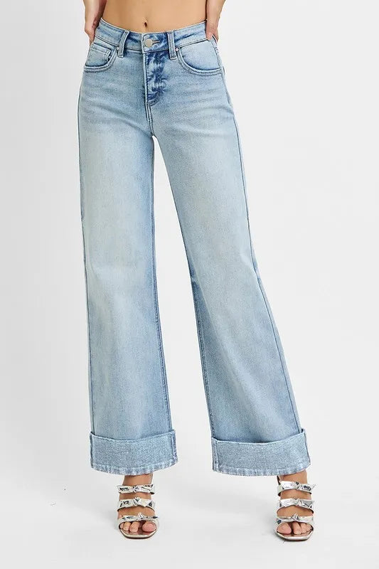 Light wash wide-leg jeans with belt loops and cuffed ankle hem