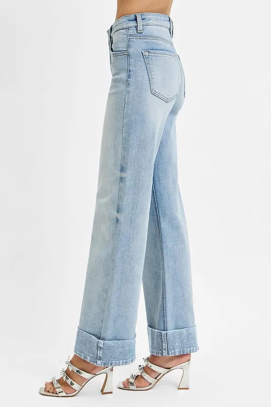 Light wash back view: wide-leg jeans with patch back pockets