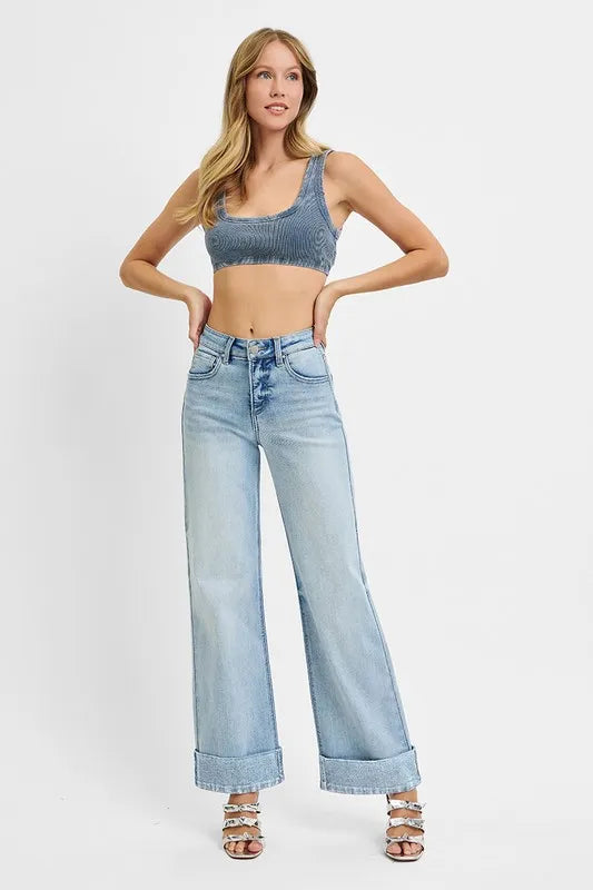 Light wash high-rise wide-leg jeans with cuffed ankle hems and belt loops
