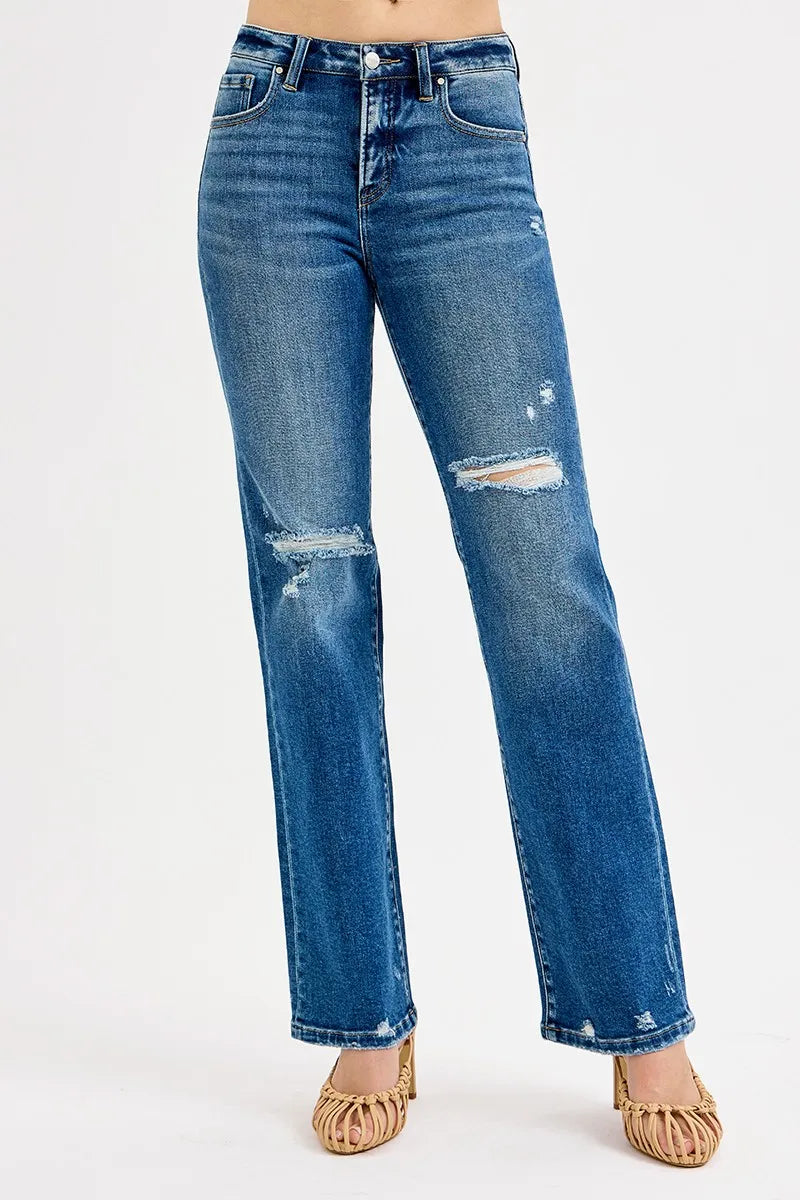 Dark blue high-rise straight jeans with tummy control, distressed knees and light wash spots