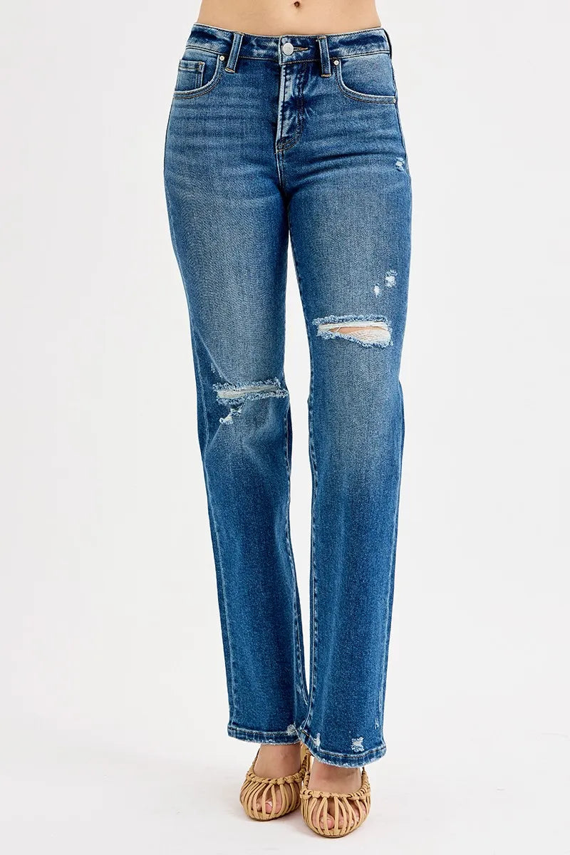 Dark blue high-rise straight jeans with front rips, frayed hem and worn-in wash