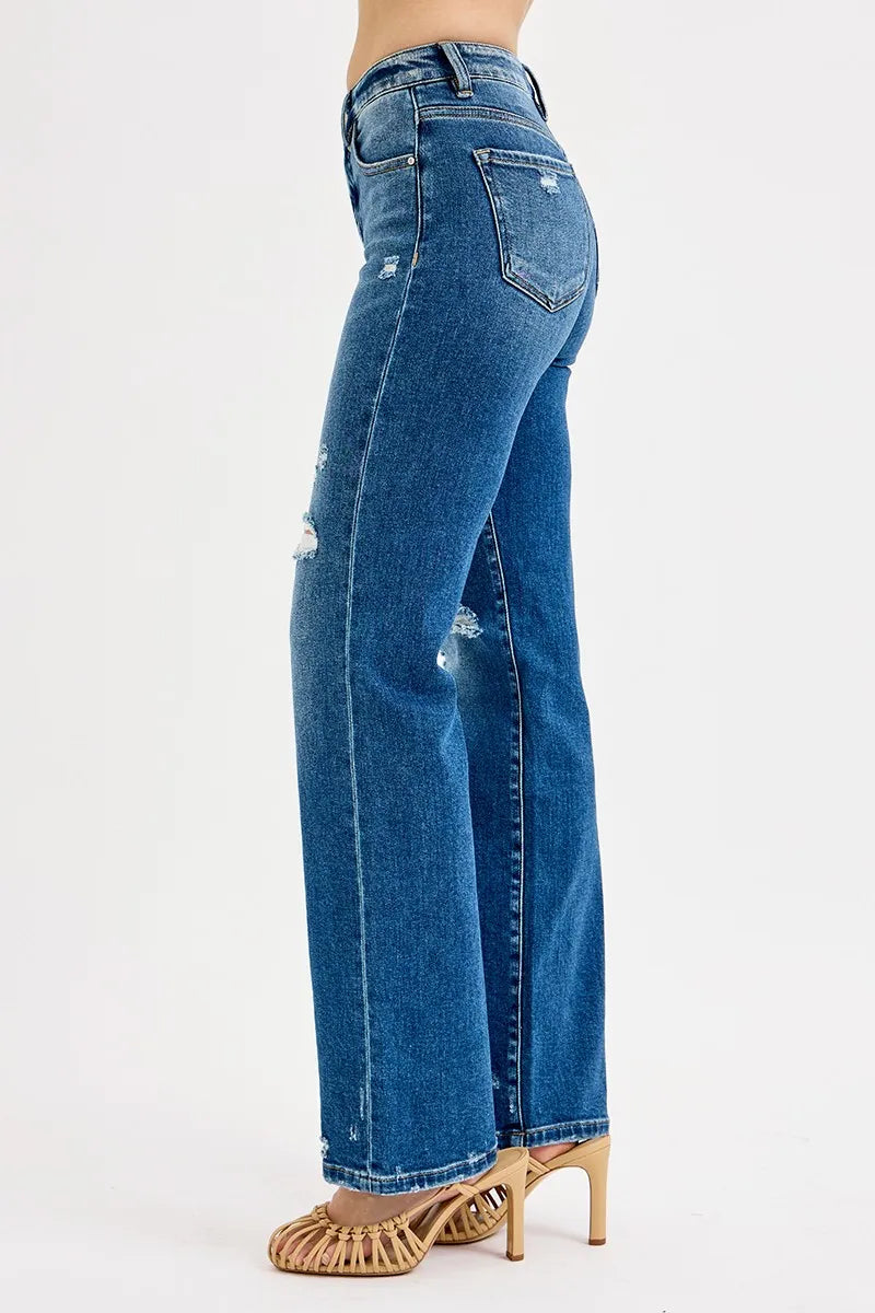 Back view dark blue straight jeans with high-rise waistband, rear pockets and side distress