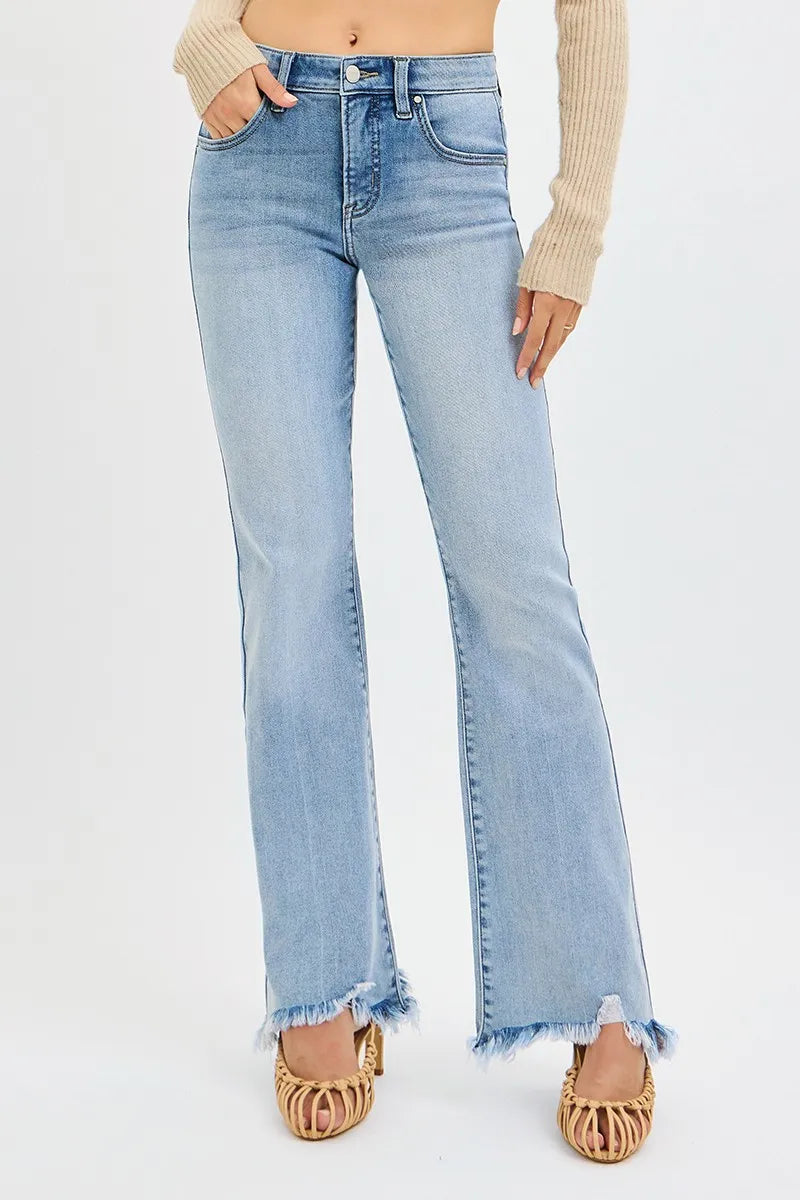 Medium wash mid-rise flare jeans with frayed hem and button-and-zip closure