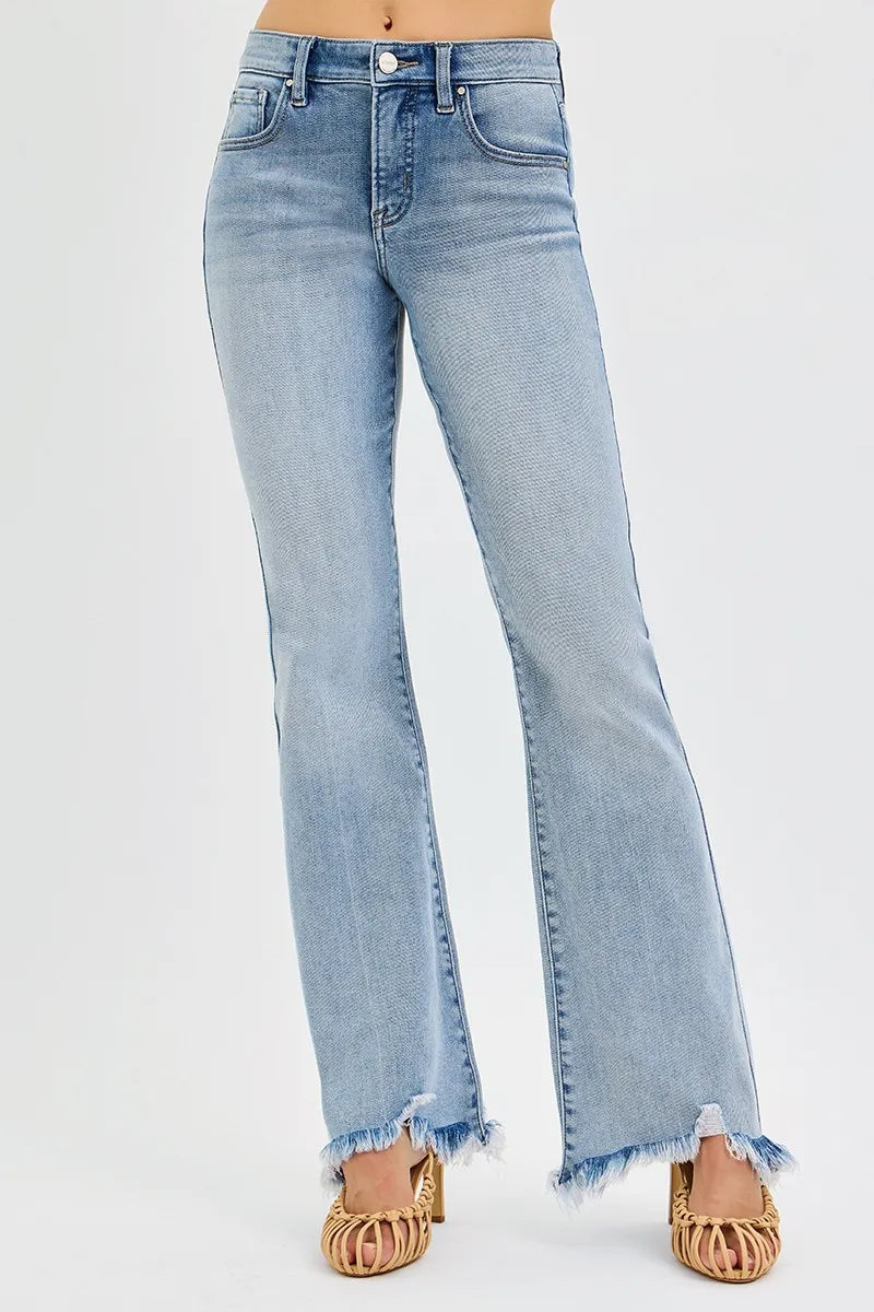 Medium wash mid-rise flare jeans featuring frayed hem and front seam detail