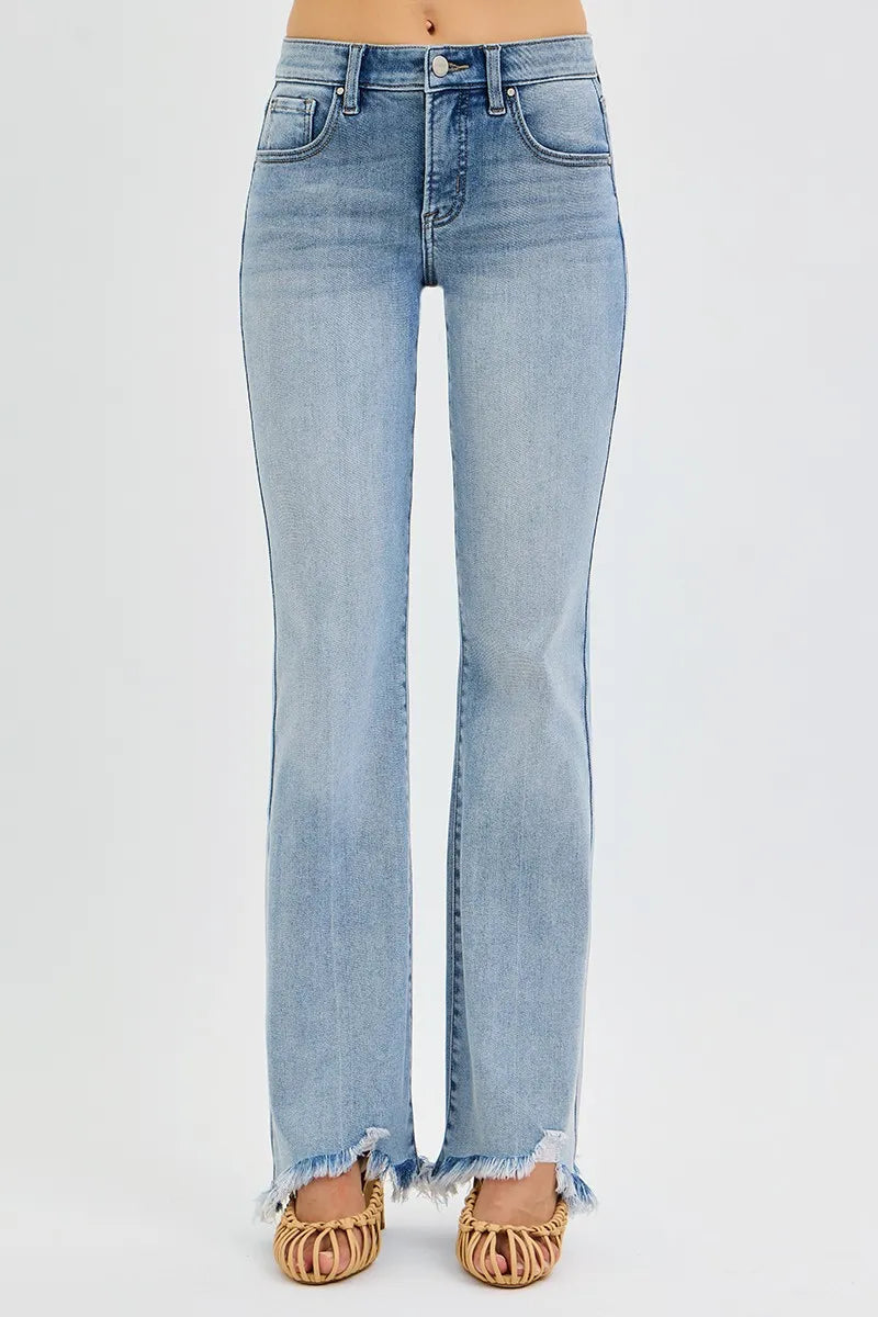 Back view medium wash mid-rise flare jeans with frayed hem and back pockets