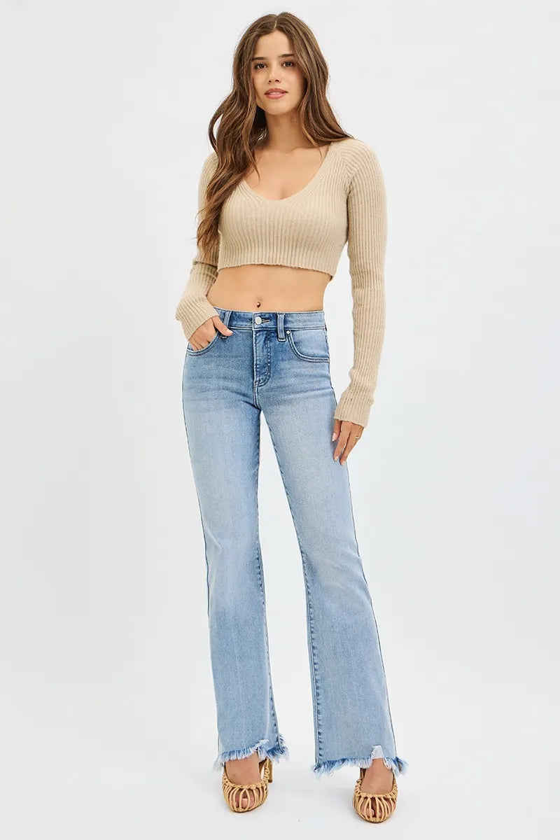 Full look medium wash mid-rise flare jeans with frayed hem and classic five-pocket design
