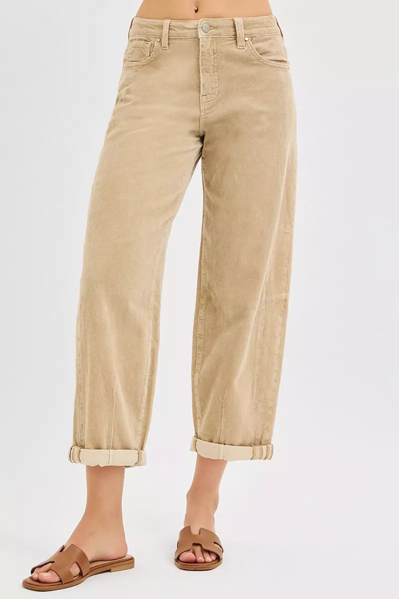 Tan corduroy high-rise cropped barrel pants with front pockets and rolled cuffs