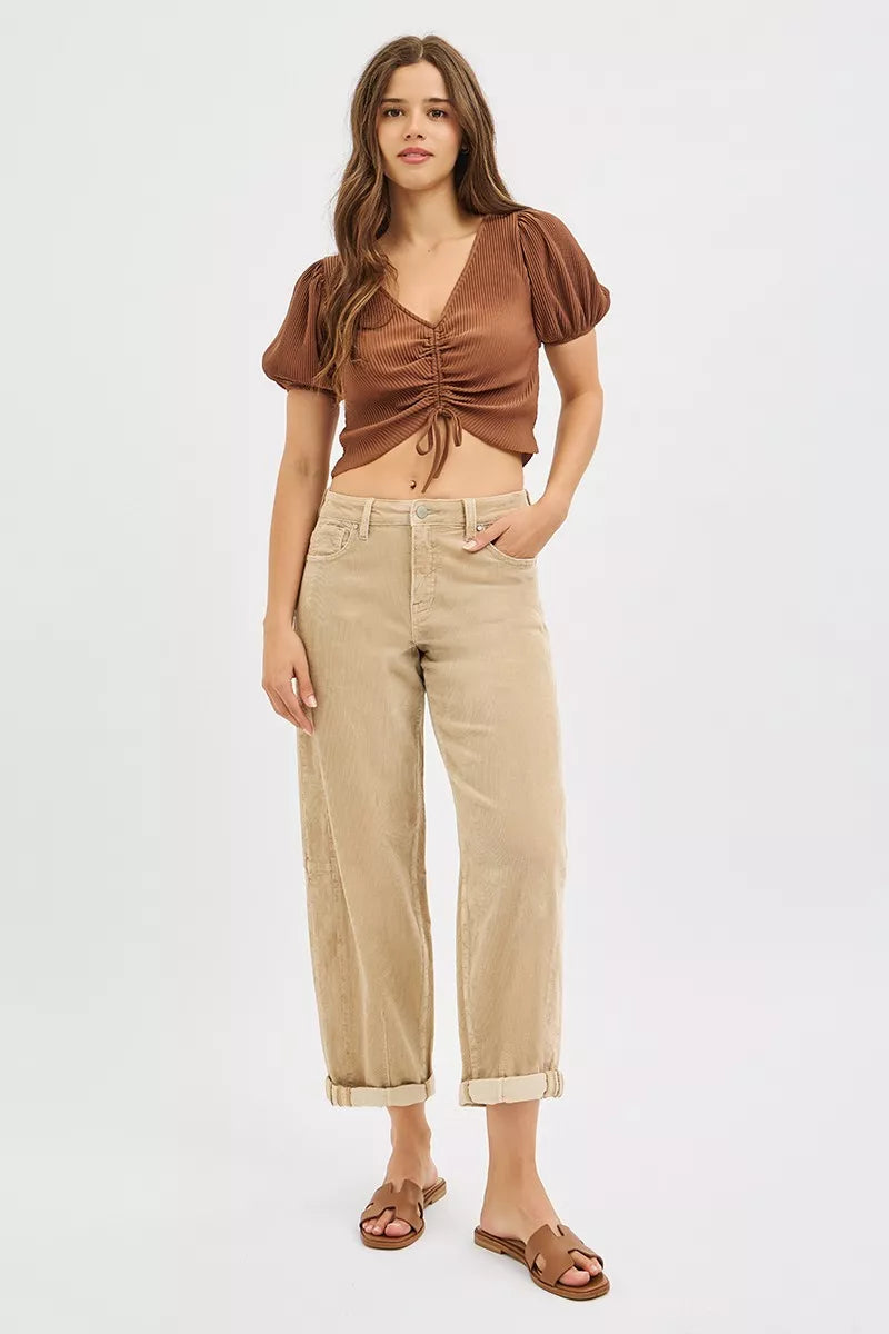 Tan high-rise cropped barrel corduroy pants with front button and cuffed hem