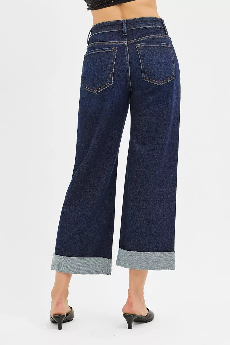 Dark mid-rise wide-leg jeans, back pockets and rolled cuff hem