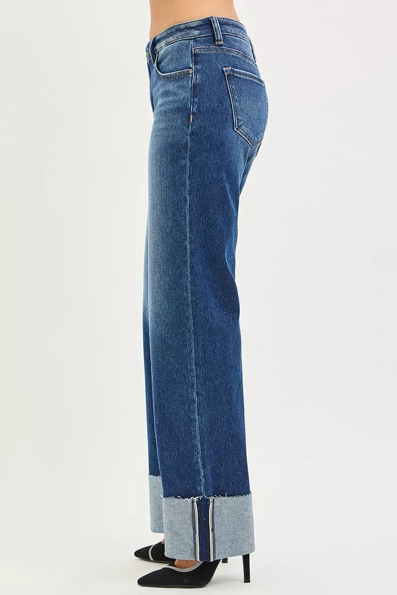 DARK wide-straight jeans, mid-rise, side view with wide cuff hem detail