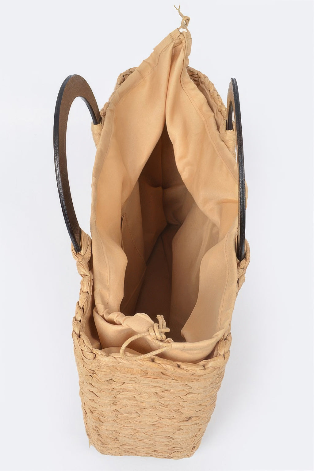 Straw tote bag interior view with drawstring pouch base
