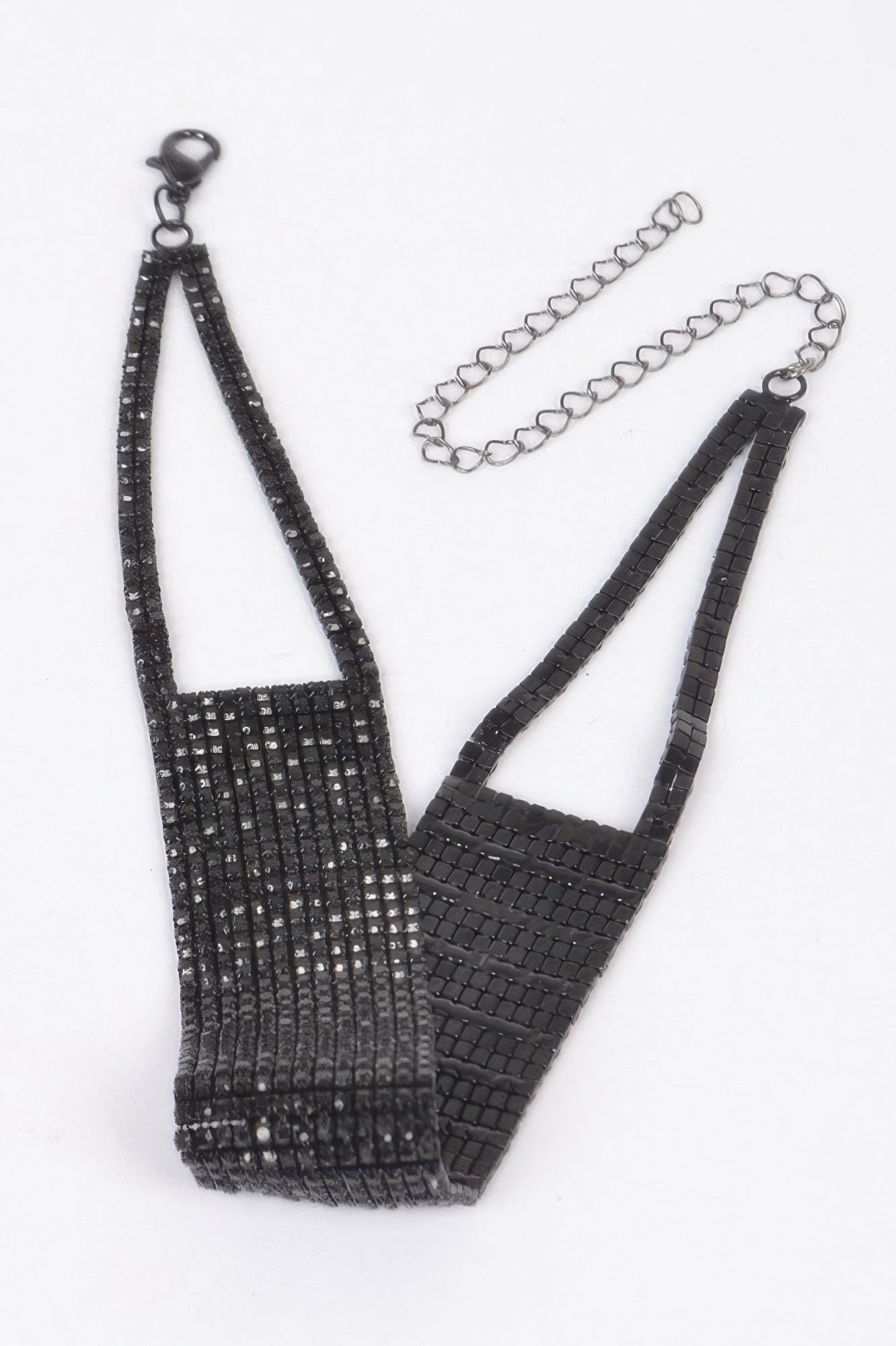 Black rhinestone choker necklace with adjustable chain and clasp detail