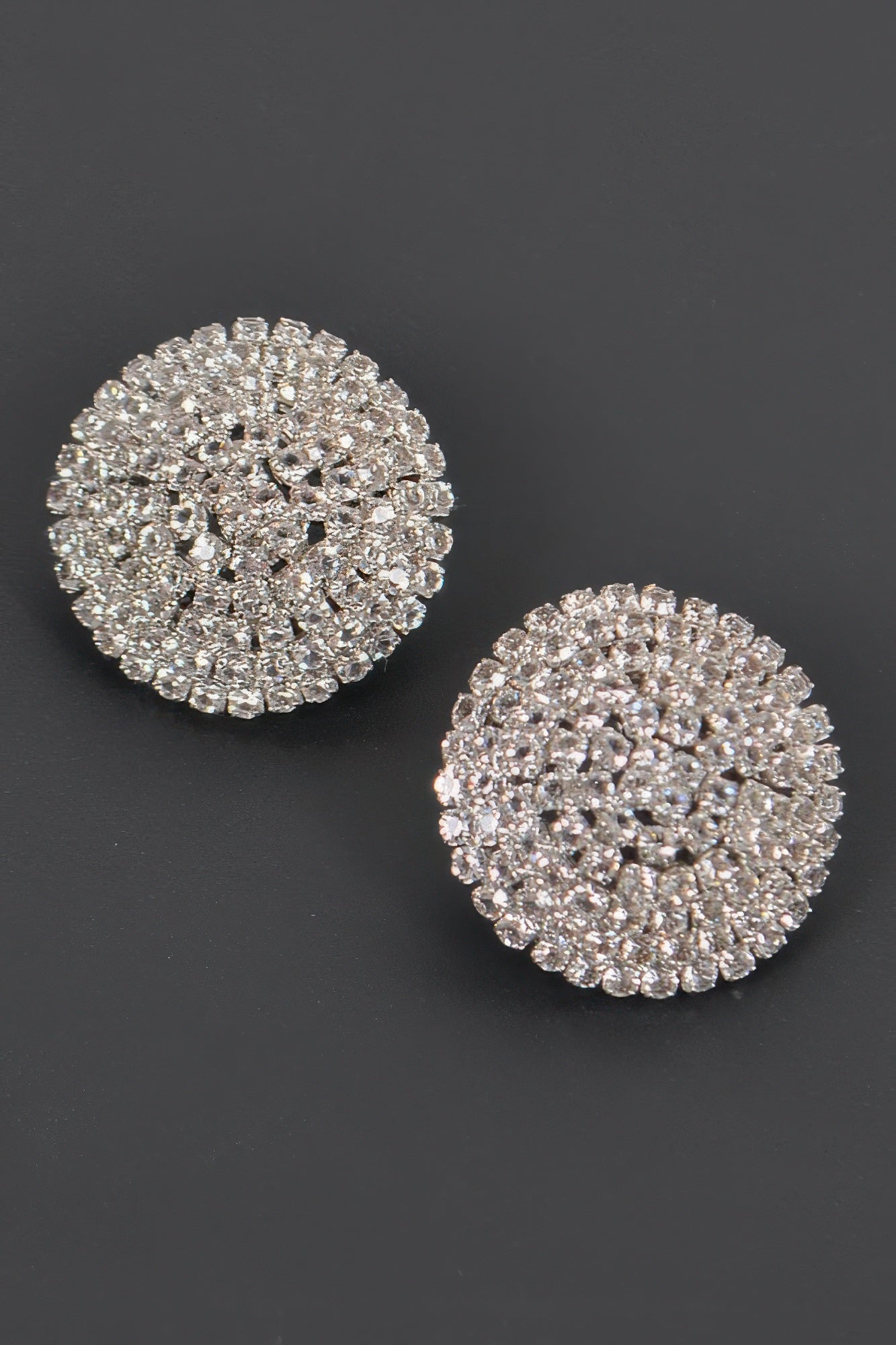 Silver round rhinestone stud earrings with dense pavé crystal setting