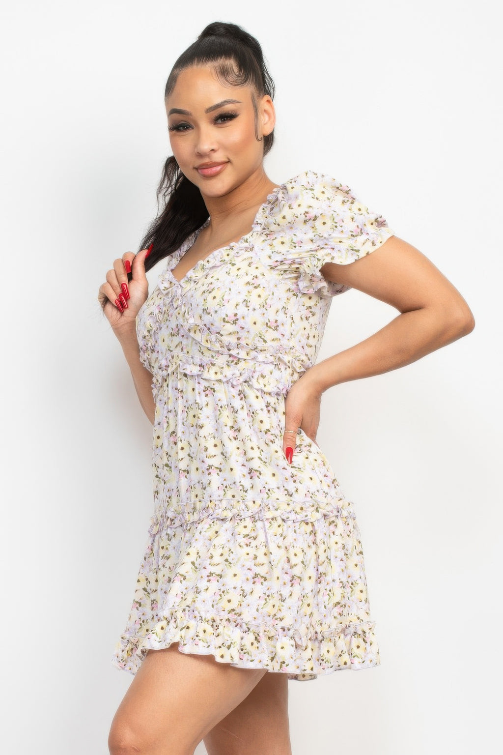 Floral puff-sleeve mini dress with ruffle tiers and sweetheart neckline