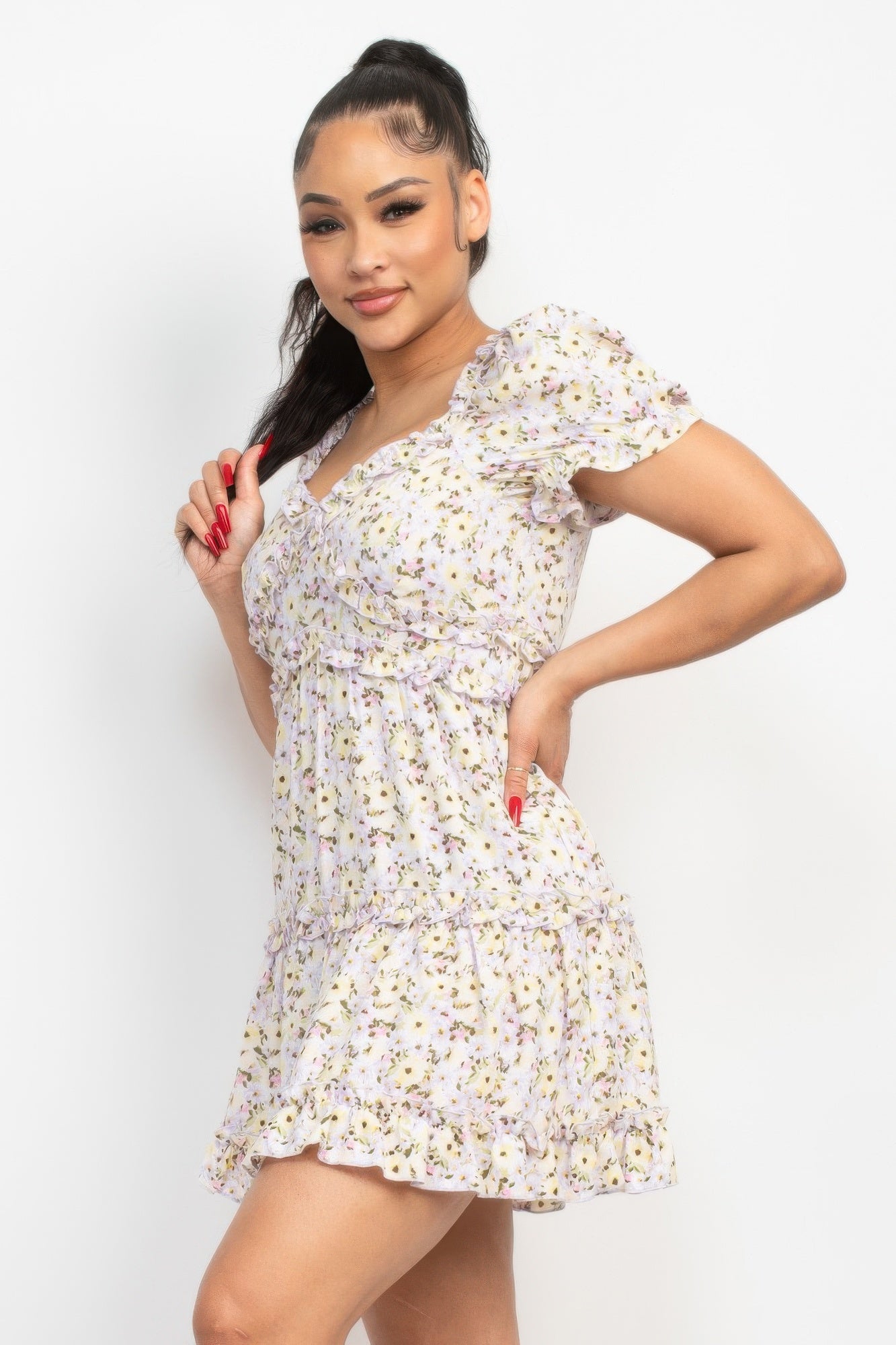 Floral puff-sleeve mini dress with ruffle tiers and sweetheart neckline