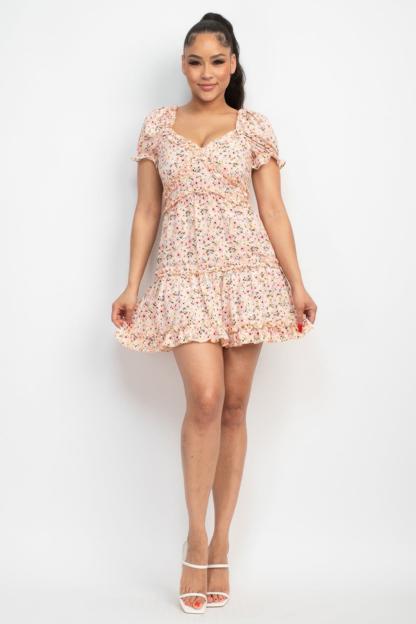 Pink floral puff sleeve dress with tiered skirt and gathered waist