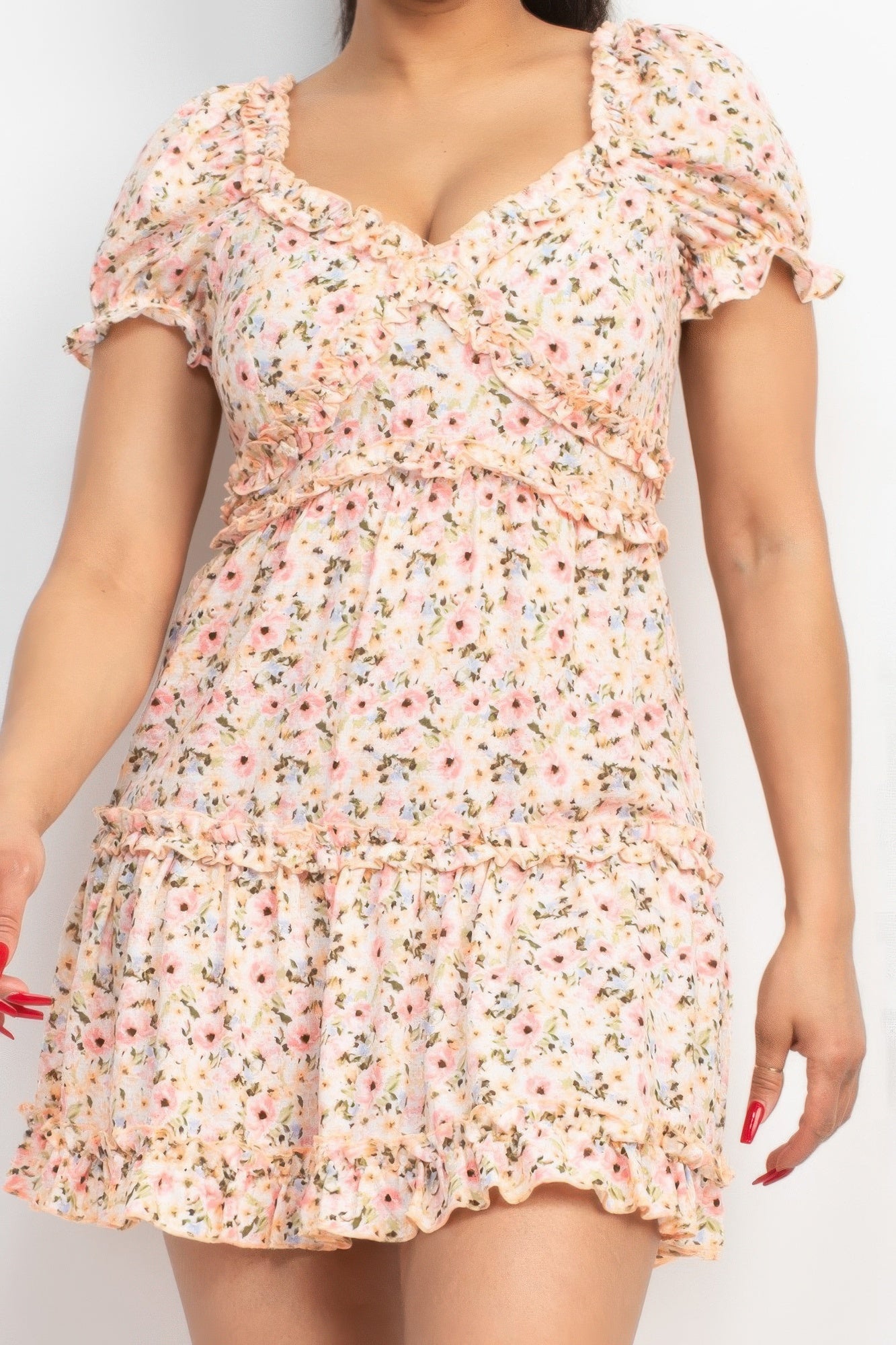Pink floral ruched mini dress with puff sleeves and tiered hem