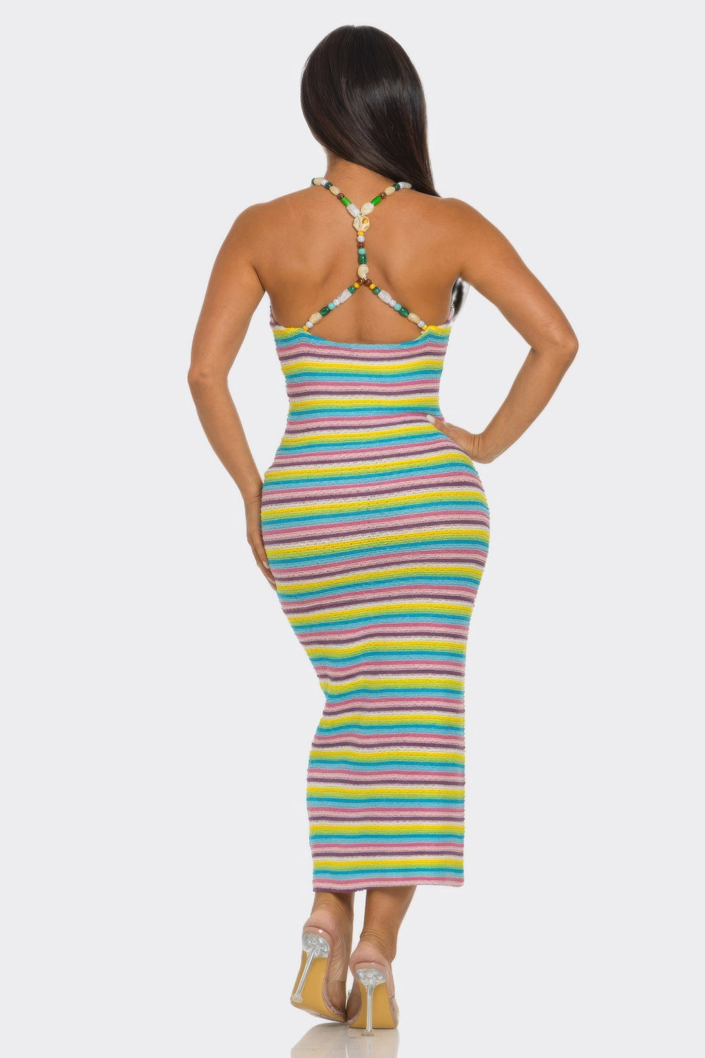 Back view of Samantha Midi Dress: halter cross-back straps and rainbow striped bodycon fit