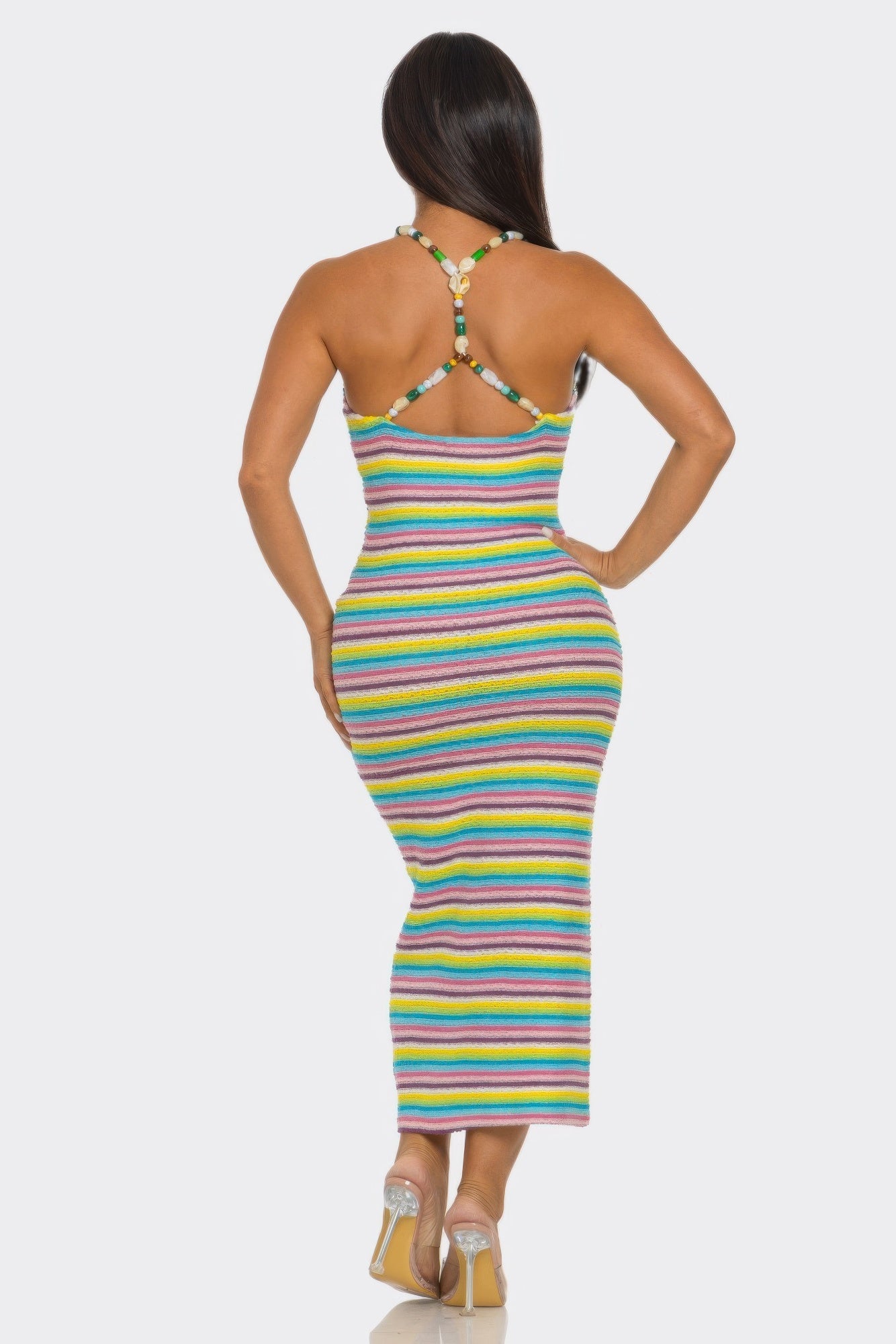 Back view of Samantha Midi Dress: halter cross-back straps and rainbow striped bodycon fit