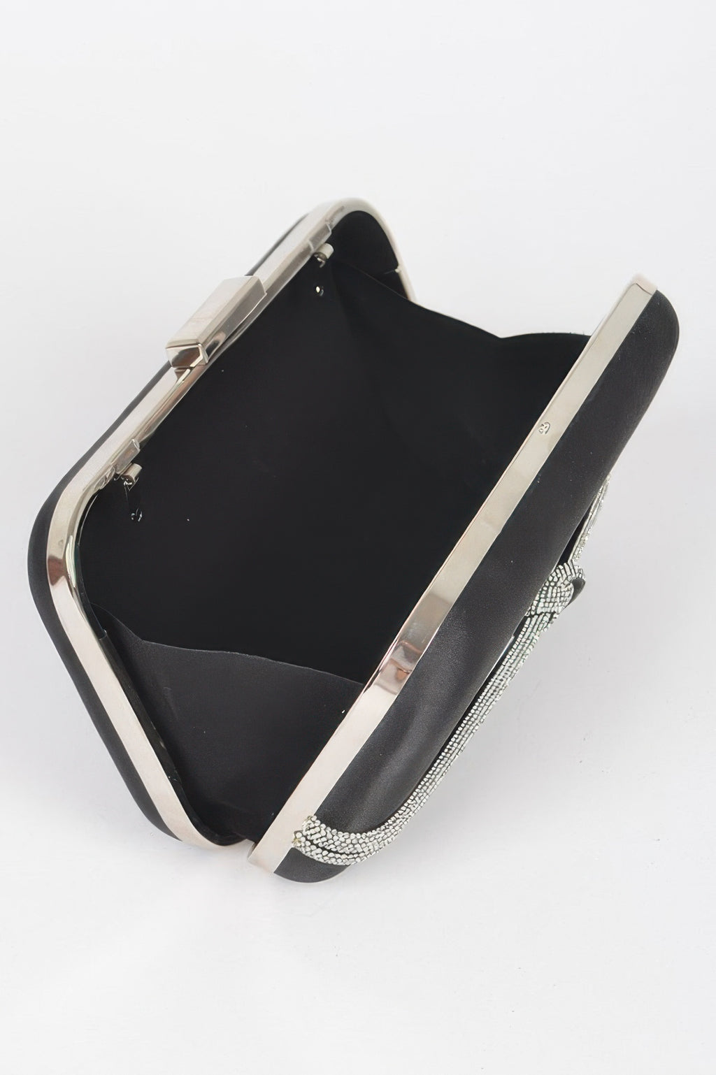 Black satin frame party clutch open view with metal frame and rhinestone chain handle